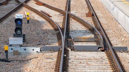 Railway tracks with switches and signals are set up for testing infrastructure components.
